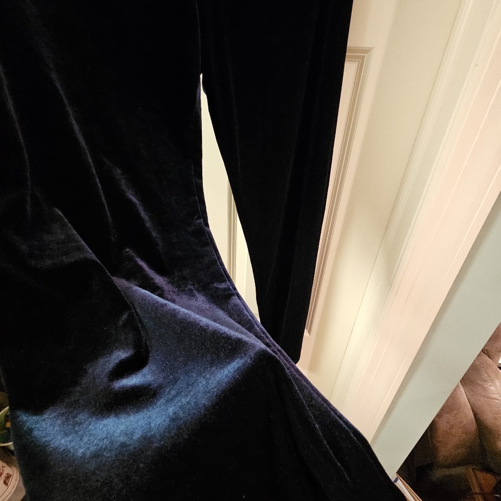 Woman's dark bluish velour slacks in size M .
